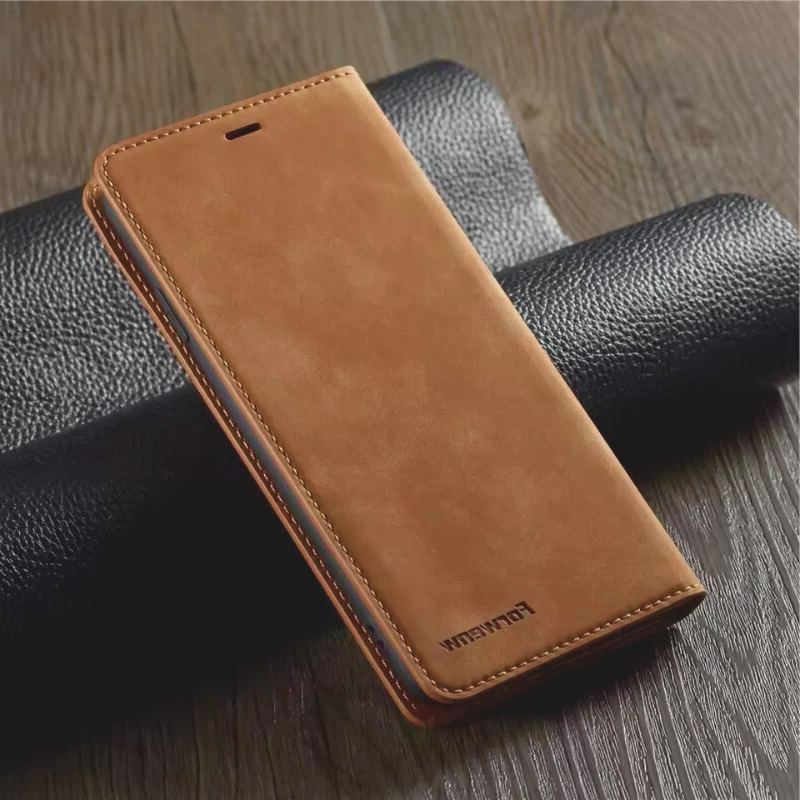 Suede Leather Magnetic Flip Wallet Case for iPhone 17 on a wooden surface
